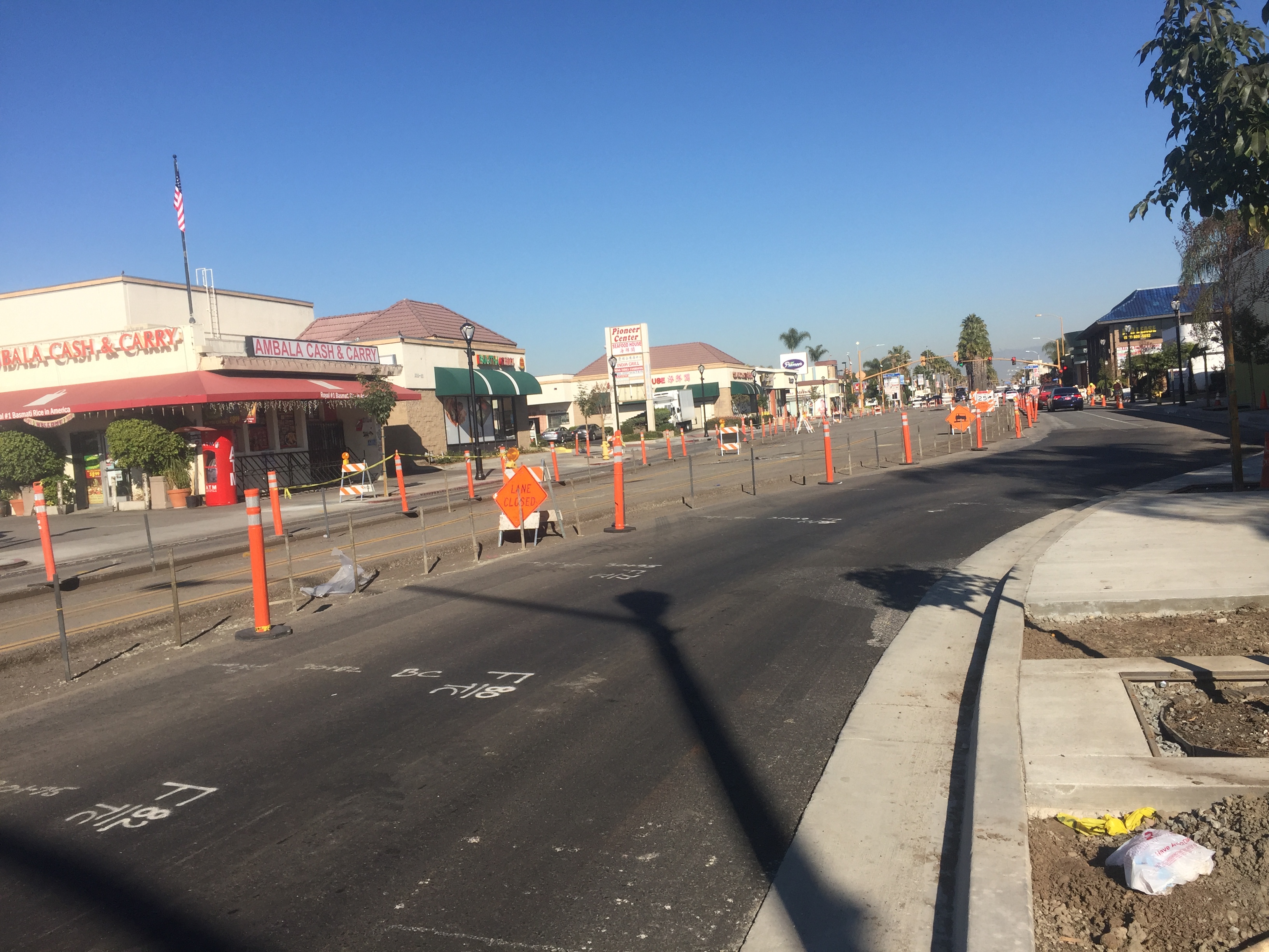 Construction crews have begun outlining and filling the center median on Pioneer Blvd. near 183rd Street.